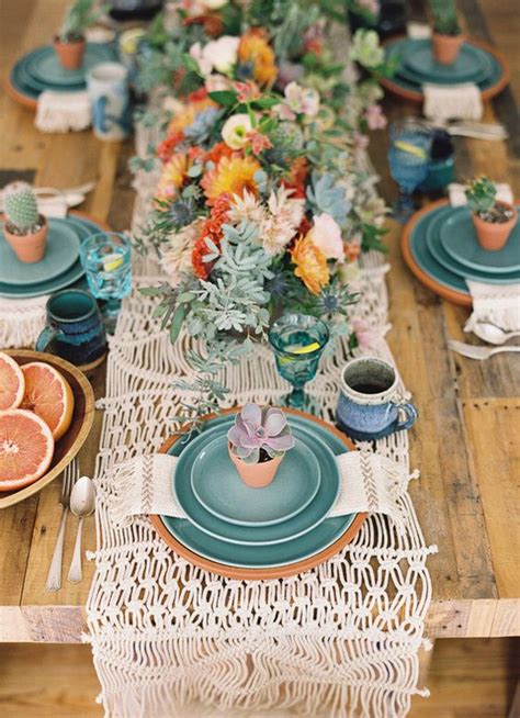 Boho style wedding reception dinning table with macrame tablecloth. Boho succulent wedding tablescape decor - Hi Miss Puff
