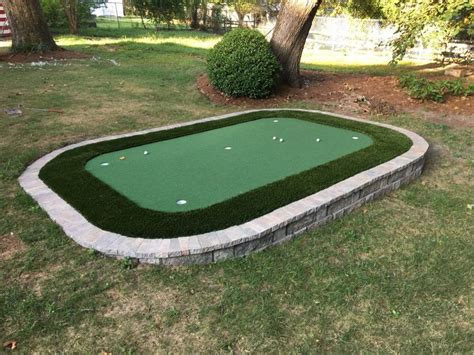 Most backyard putting greens made with real turf use creeping bentgrass. How to DIY A Stone-Bordered Backyard Putting Green (on the ...