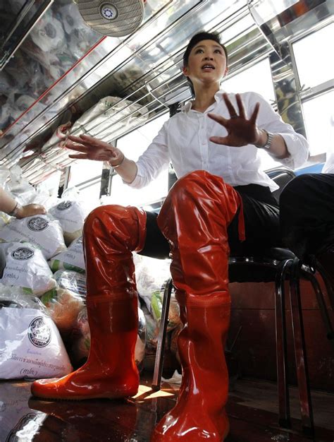 Thailands Prime Minister Yingluck Shinawatra Wearing Rubber Boots