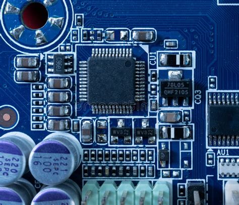Electronic Circuits In Futuristic Technology Concept On Mainboard Stock