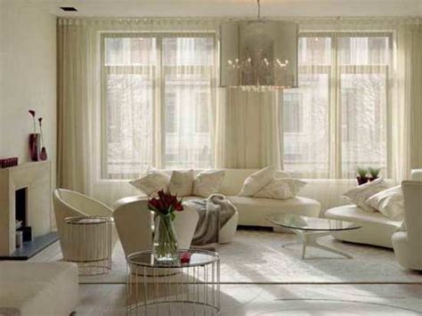 As you start browsing furniture, decorating and wall ideas for your room, think about the space's desired purpose and focus on a few staple items, such as a comfortable sofa and a coffee table, then choose the rest of the accent furniture and wall decor accordingly. Sheer Curtain Ideas For Living Room | Ultimate Home Ideas