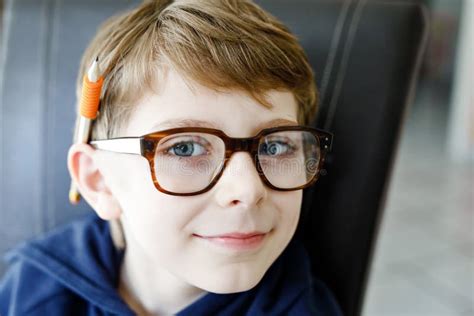 Portrait Of Little Cute School Kid Boy With Glasses Beautiful Happy