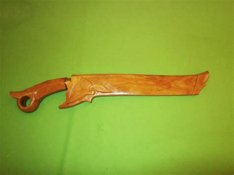 Maybe you would like to learn more about one of these? 7 LOK: Pisau 9" Kayu Cempedak Ukir (sold)