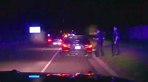 Police Dashcam Shows Driver Buzz Officers In Terrifying Near Miss Bring Me The News