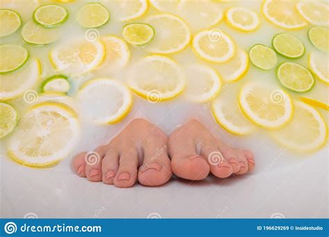 Girl Takes A Milk Bath With Lemons And Limes Citrus Spa Body Care