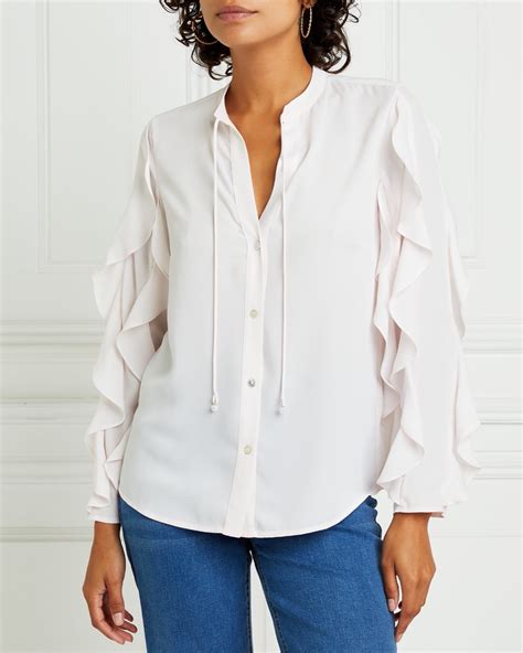 dunnes stores ivory gallery ruffle blouse