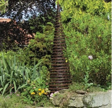 A wrought iron garden topiary and garden obelisk accents your decorative garden and flower pots. twist willow garden obelisk by garden selections ...