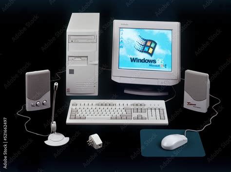Nineties Obsolete Tower Pc Computer And Windows 95 Logo On Screen