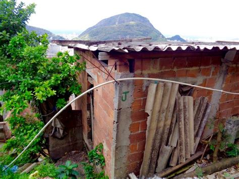 No need to register, buy now! Santa Marta Favela, Rio de Janeiro - Girl about the Globe