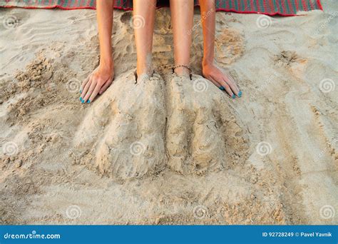 Legs Beautiful Young Woman Buried In Sand On Beach Woman Sitting On