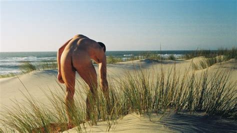 Rearview Naked Stud In The Sand Dunes At The Beach Gallery Of Men
