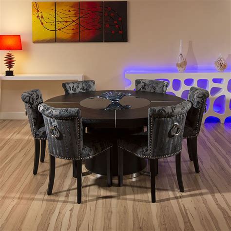 Feel like royalty at every meal with this luxurious and elegant patterned base round white dining table for indoor and outdoor use: Large Round Black Oak Dining Table + 6 Low Back Black ...