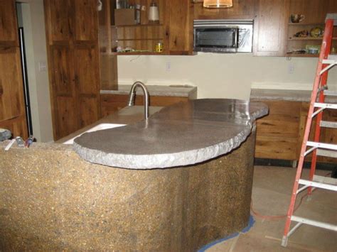 It is a good idea to have a number of people helping you so that you can do it gently and pull it away without dropping the counter or digging into the cabinets. 13 Different Ways to Make Your Own Concrete Kitchen Countertops | Hometalk