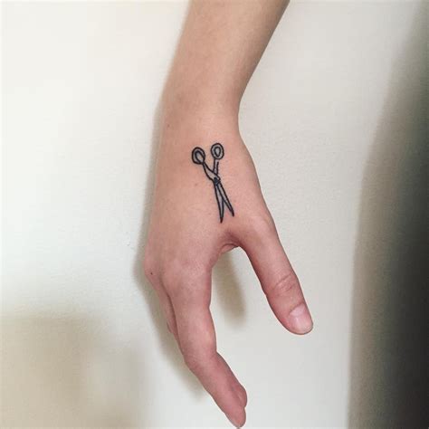 Tiny Scissors By Suki Lune Inked On The Right Hand Neck Tattoo