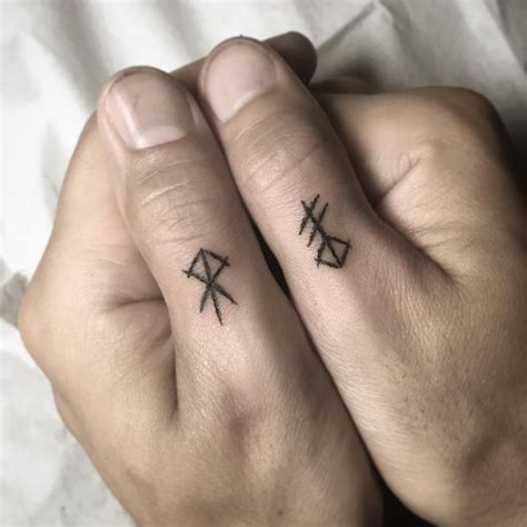 Rune Tattoos On Both Thumbs Finger Tattoos Hand Tattoos Rune Tattoo