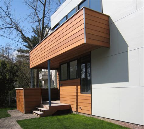 Siding gives you a great way to add color and definition to your house. Exterior: Combination of cement siding and wood planks ...