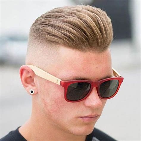 The idea behind this cute haircut is to chop the strands to a short and uniform length at the top and create a stylish razor to create it you should chop the sides to form an undercut and give them a bald fade. Brushed Up Hair on Top with High Bald Fade # ...