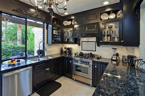 The most beautiful kitchen renovation in a 1905 home black and white tile is a pretty classic look and i think you can pull it off with the kitchen you are black antiqued granite countertops. Black Granite Countertops (Colors & Styles) - Designing Idea
