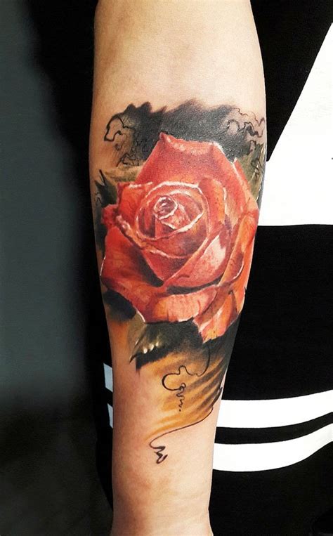 While this forearm tattoo hasn't been completely filled in yet, the stunning detail in the large rose in the center gives you some idea of how fabulous it is going to look when done. 30 Forearm Tattoos For Women To Try - Flawssy