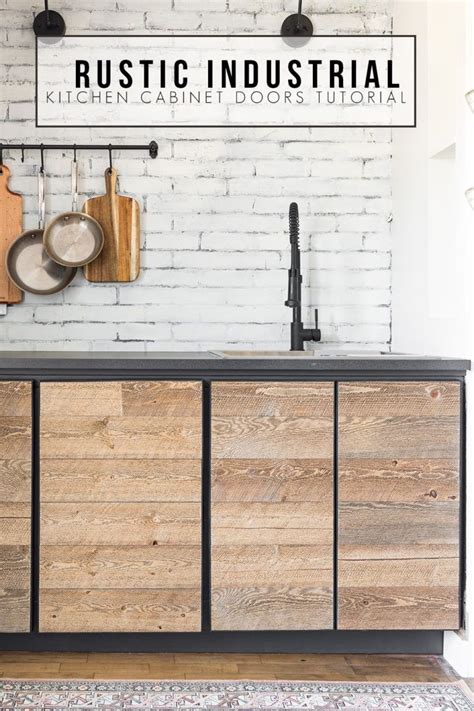 An Industrial Kitchen Cabinet With Black Metal Handles And Wooden