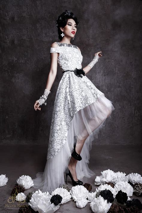 A white or black tuxedo and white shirt with black bow tie. Classic Mullet Wedding Dress In Black And White Floral ...