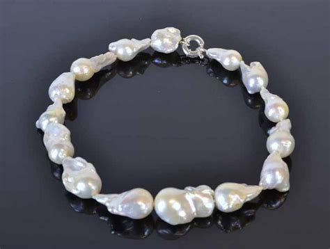 That will help you to know what necklace lengths she prefers. Baroque freshwater pearl necklace pearls measure from ...