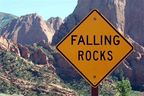 Falling Rock Sign Stock Photos Pictures And Royalty Free Images Istock