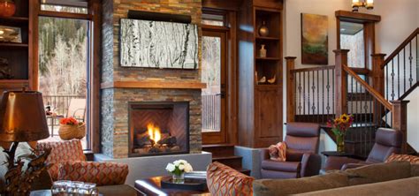 At its center is the nicely appointed electric firebox featuring a molded log set and ember bed. 41 Stacked Stone Fireplace Ideas | Sebring Design Build