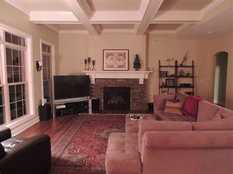 This Custom Living Space Has A Custom Coffered Ceiling Stone Fireplace