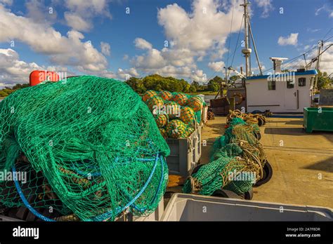 Fishing Nets On A Fishing Cutter Or Fishing Boat In Port Overfishing