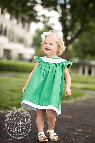 Top with a leather or denim jacket to complete the look.dress details: Sandy Smocked Dress - Kiawah Kelly Green with Smocking | Kids fashion girl, Toddler girl style