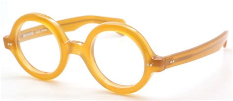 thick rimmed true round 180e style italian acetate eyewear by beuren big round in a honey