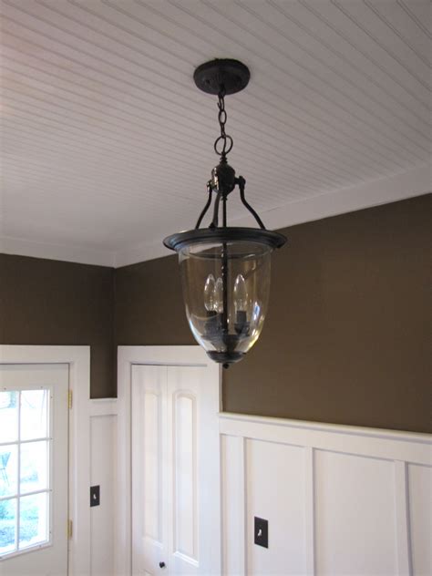 These board & batten walls feature windsorone s4sse trim boards and are a feature on both floors of this home. DIY Board and Batten Tutorial (in our laundry room ...