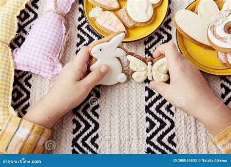 Childs Hands Showcase Easter Cookies, Joy of Easter Traditions Concept