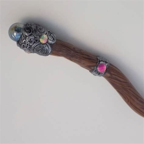 polymer clay wood wand with antique silver accennts crystals and glass orb by polygems on
