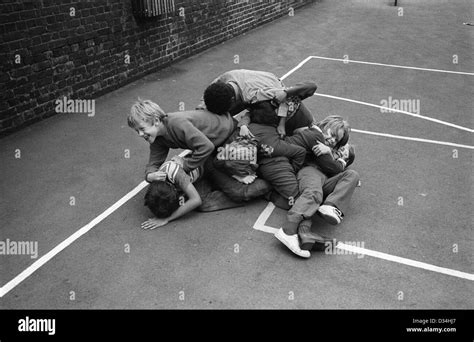 Junior School Children Boys Play Fighting Playground Games South