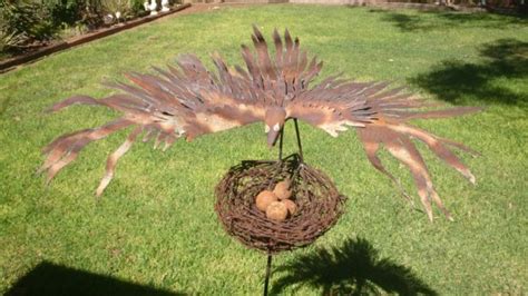 Enhanced forms of barb wire includes razor barbed wire, flat razor wire, concertina and gi barb wire: Eagle made from old corrugated fencing, barbed wire nest ...