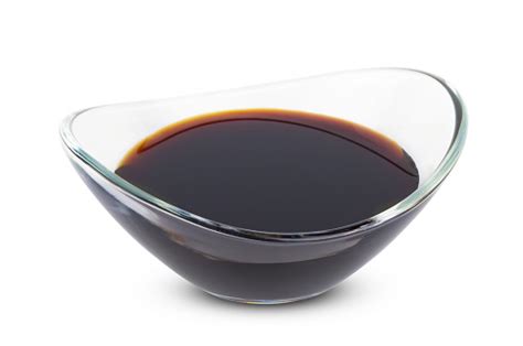 Soy Sauce In Transparent Glass Bowl Isolated On White Background Stock