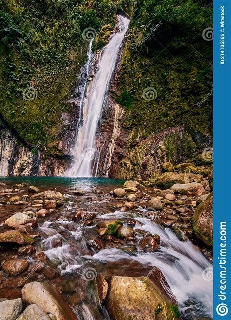 Vertical Shot Of The Hidden Treasure Waterfall In Costa Rica Stock