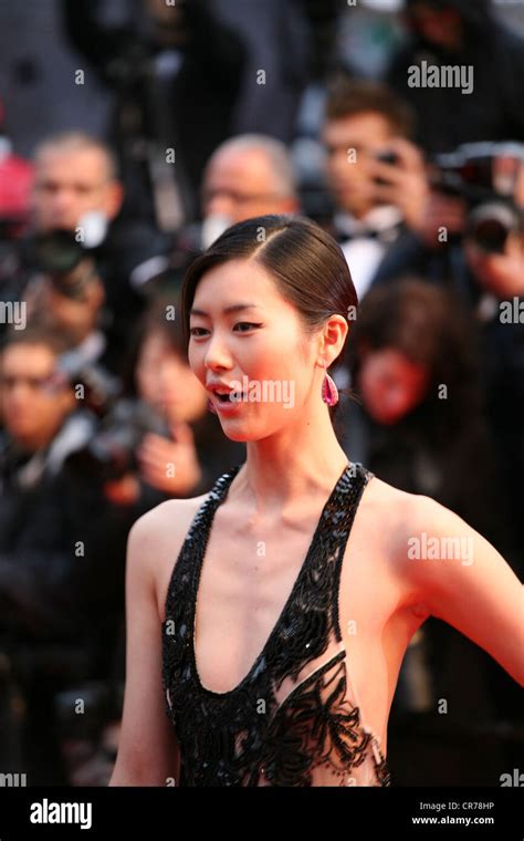 Liu Wen Attending The Gala Screening Of Amour At The 65th Cannes Film