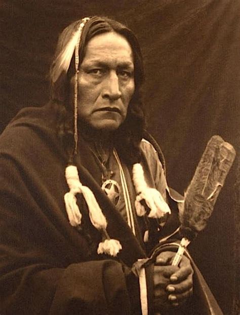 An Old Photo Of A Native American Man