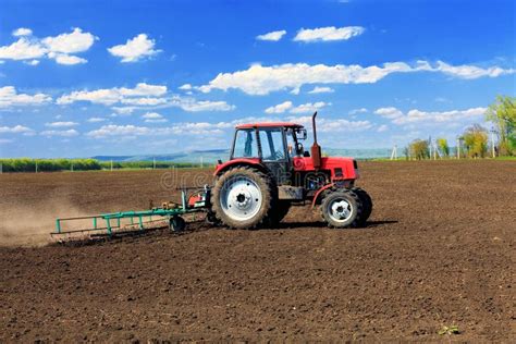 Tractor Plowing The Fields In Early Spring Stock Image Image Of