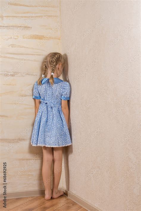 Babe Girl Being Punished Standing In The Corner Stock Photo Adobe Stock