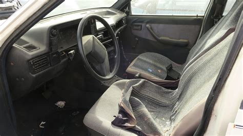 Junkyard Gem: 1988 Pontiac LeMans Sedan | Autoblog