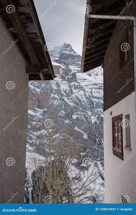 Snow Capped Mountain Range And Holiday Homes At Murren Switzerland