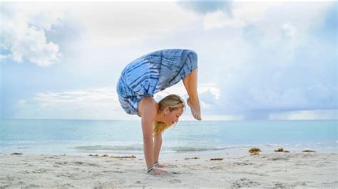 yoga beach handstand