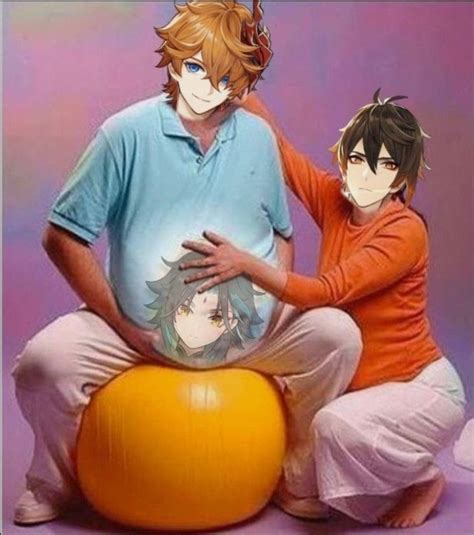 Two People Sitting On Top Of An Orange Ball With One Person Holding The Others Stomach