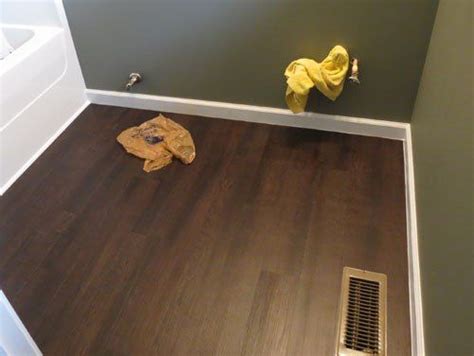 Now we're putting down the smartcore pro product in our family room. Finished bathroom floor using Smartcore vinyl plank ...