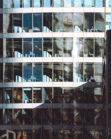 Clear Glass Windowed Low Rise Building · Free Stock Photo
