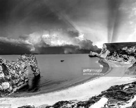 Durdle Door Storm Appoaching Dorset England High Res Stock Photo